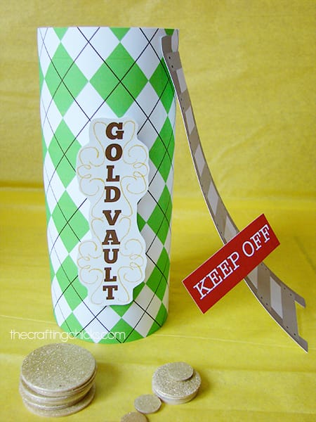 Leprechaun trap made out of a cookie can with scrapbook paper