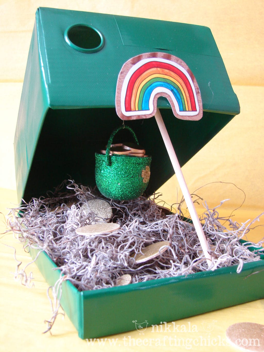 Leprechaun Trap made out of an old shoe box. Painted green with a treasure inside.