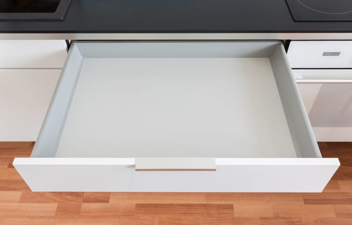 opened white empty drawer