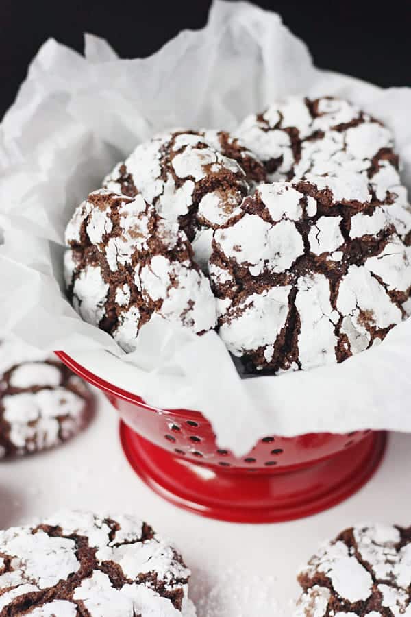 Red bowl full of Decadent Double Chocolate Crinkle Cookies