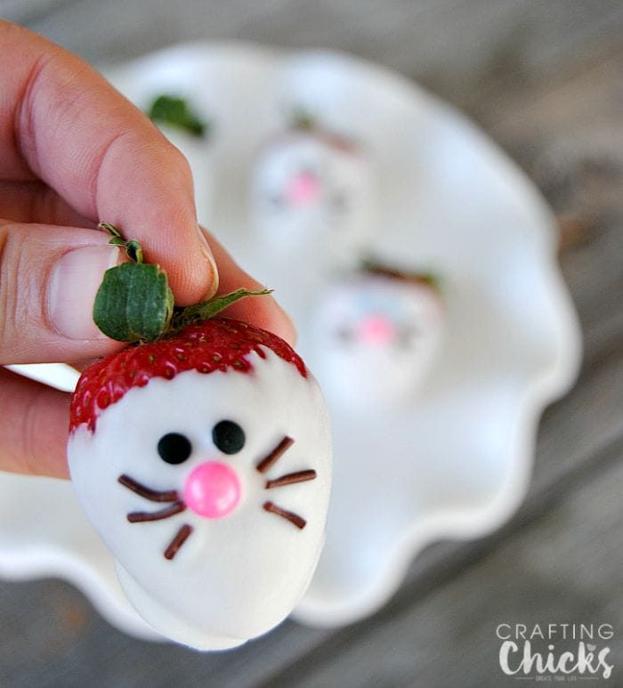 Bunny Face Strawberries! Dip bright ripe strawberries in white chocolate and create sweet faces with sprinkles! This is the cutest Easter dessert!