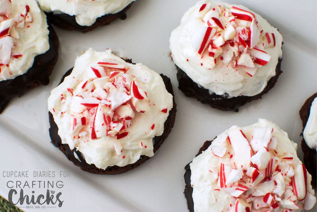 Chocolate and peppermint are the ultimate flavor combo for Christmas. Throw them together on a perfectly chewy and chocolatey cookie and you've got yourself the perfect holiday dessert! Chocolate Cookies with Peppermint Buttercream Frosting are great for neighbor treat plates.