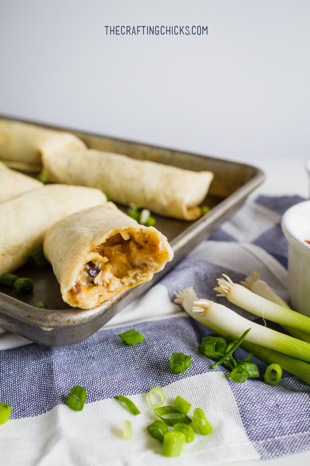 Spicy Black Bean Burritos - one of our favorite family recipes! Perfect for lunch on the go or a quick dinner. Don't forget to make extra to freeze!