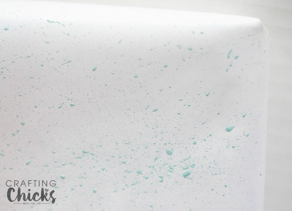 paint splatters on white paper for Springtime Gift Wrap