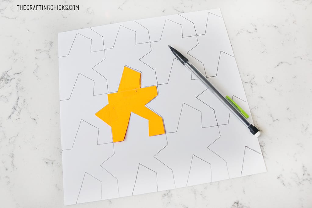 This Escher Inspired Tessellation Art for Kids will keep kids busy for hours! Tessellation art is the perfect mix of art and math, and is inspired by Escher, an amazing artist!