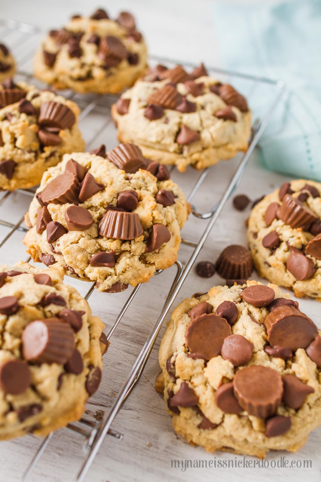 Peanut Butter Cup Chocolate Chunk Cookies on a wire rack