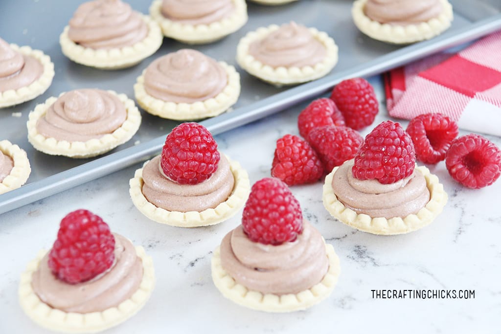 Mini Chocolate Mousse Pies | A simple holiday dessert. This recipe is so easy to make and always a favorite at parties!