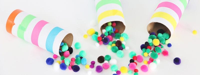New Year's Eve Poppers are a fun project for kids to make to celebrate the New Year. We made these for our Noon Year's Eve party and they were a hit. Easy to make with a few simple supplies you probably have around your house.