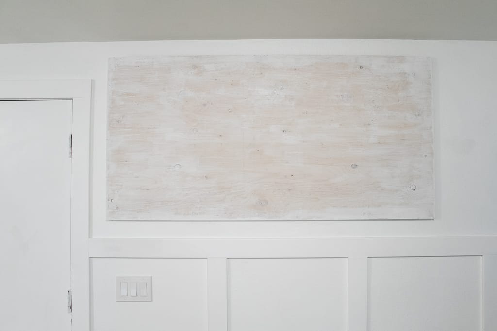 White washed board for family command center.
