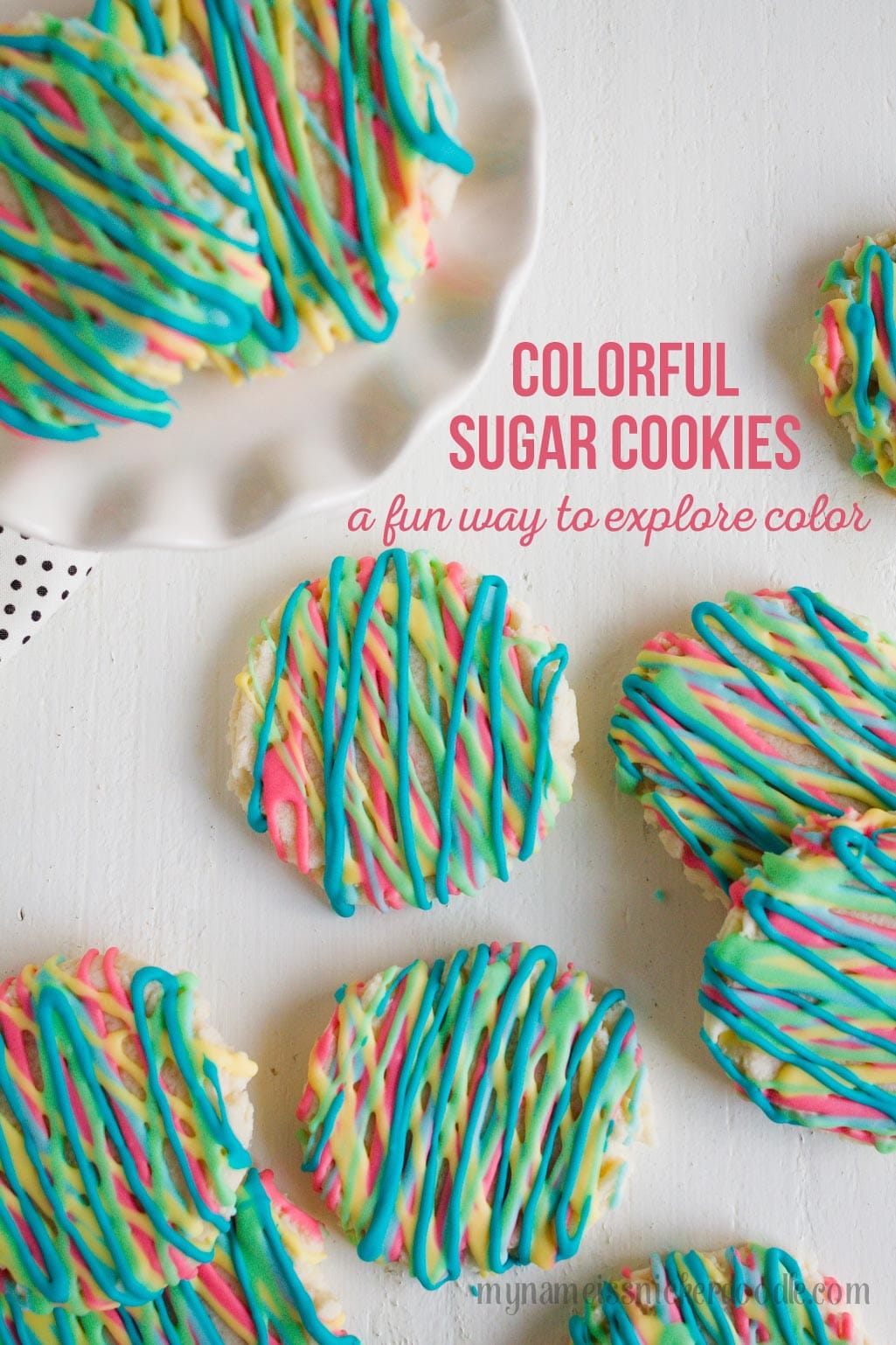 Colorful Sugar Cookies are a fun way to explore color and eat your food too. These delicious sugar cookies are made with an easy recipe that will keep you coming back for more. It will become your new go to sugar cookie recipe. #sugarcookies #cookierecipe #sugarcookierecipe #swigsugarcookierecipe