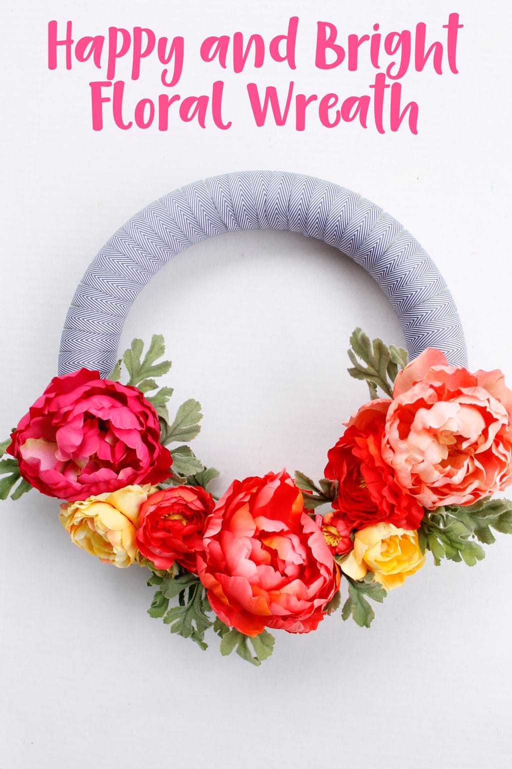 Freshen up your house with this Happy and Bright Floral Wreath. This wreath comes together quickly and is a fun addition to any home decor. #floralwreath #wreathdiy #springwreath #summerwreath