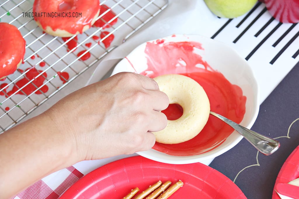 Dipping apple donuts