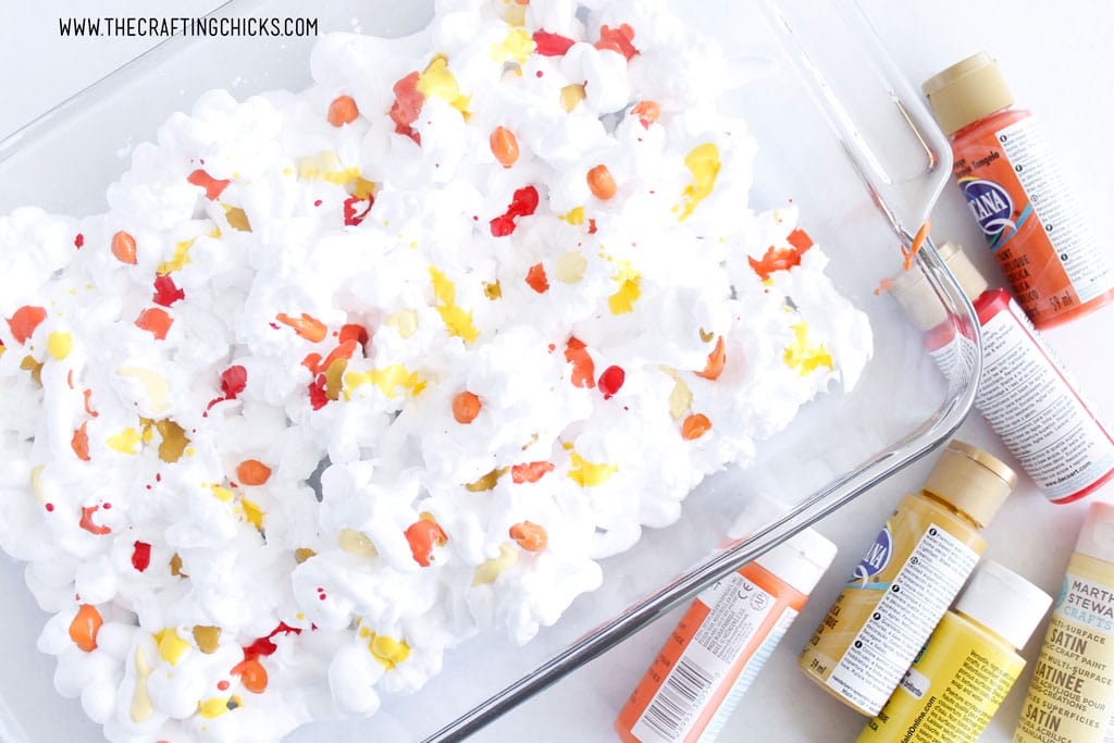 Yellow, orange, and red paint in shaving cream for shaving cream fall leaves
