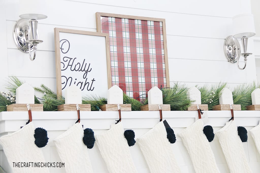 Oh Holy Night Printable framed on a white Christmas Mantel with red plaid background print