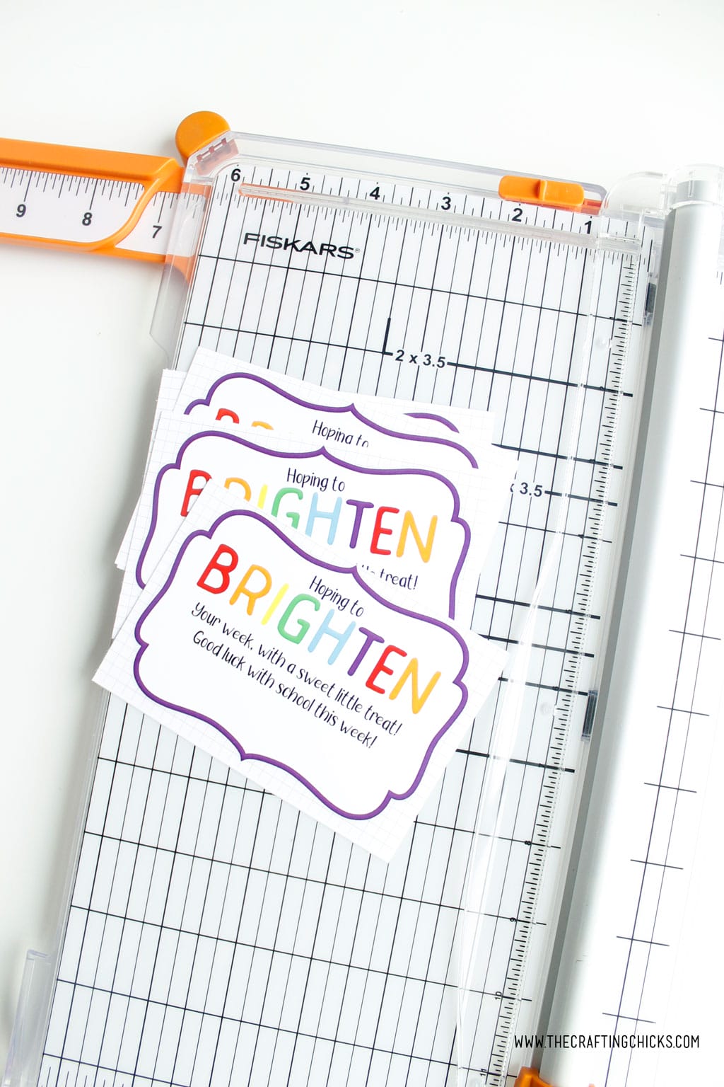 Brighten your day printable gift tags cut into squares using a paper trimmer