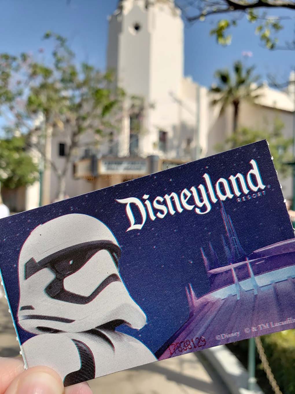 Disneyland Ticket options, Disneyland ticket in front of Disneyland