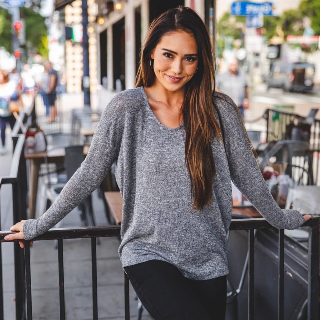 Fall Lightweight Sweater in gray with women standing against fence