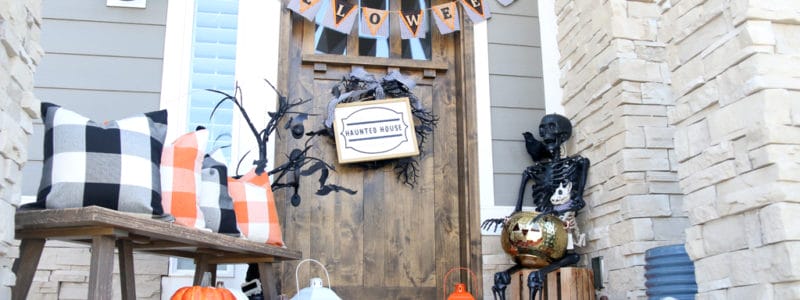 Cute Plaid Halloween Porch with black, white and orange colors.