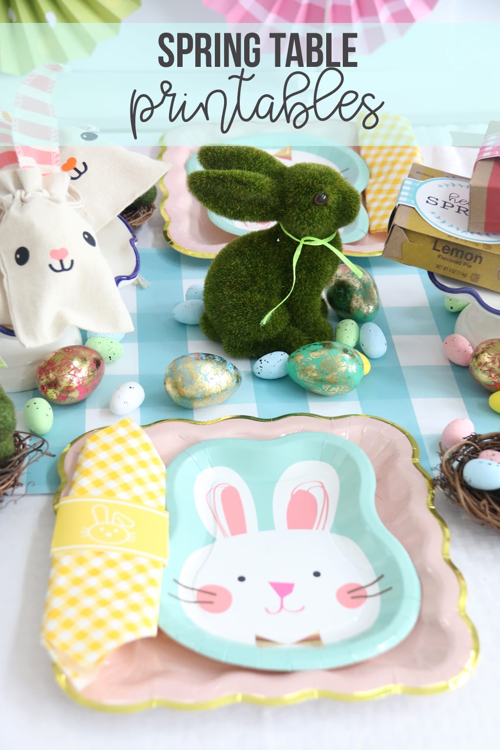 Easter table for kids with bunny paper plates, yellow gingham napkin and bunny decorations