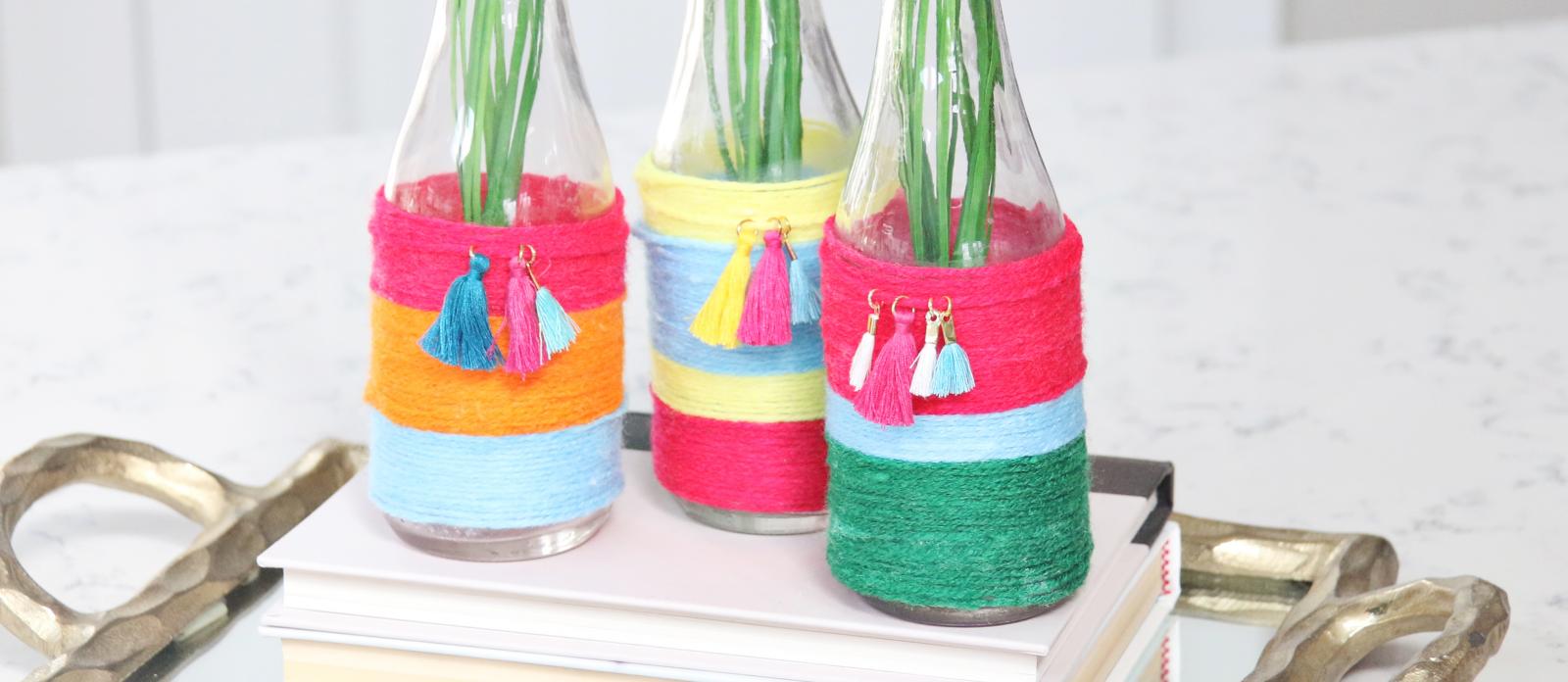 colorful yarn wrapped jars