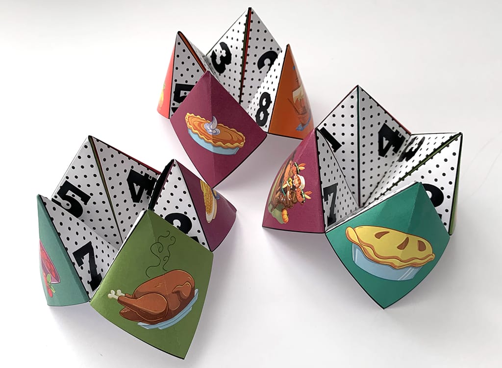 folded Thanksgiving Cootie Catchers on white background