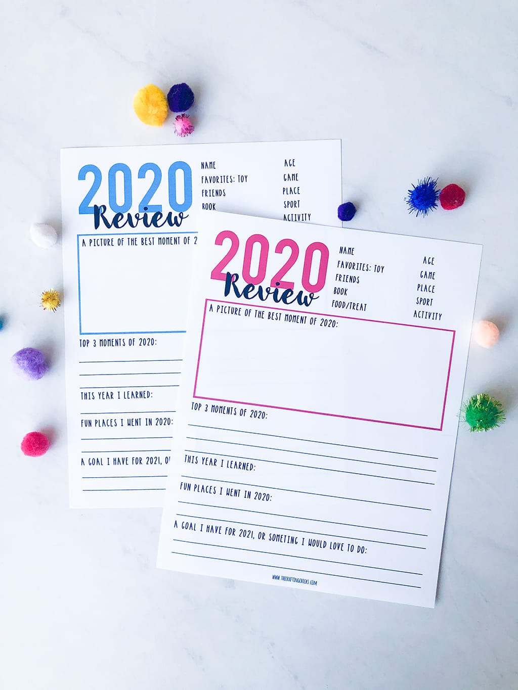 Year in Review printables on a white background with blue and pink type.